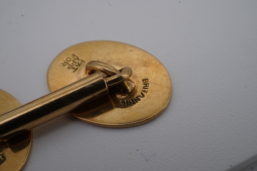 A pair of gold cuff-links, each end of oval outline with striped engraving, to a bar connector, each end 1.8cm, each stamped 18ct, combined gross weight approximately 9.5 grams, maker's marks EH, case stamped Jay's, Cond